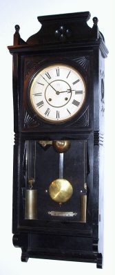 C.1883 Seth Thomas Clock Co., Thomaston, Conn: "Flora" model wall clock in ebony finish with 8-day time and strike weight movement. — Antique Clocks Price Guide