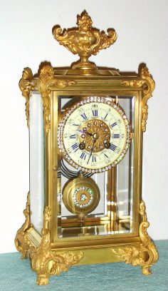 C.1890, French, Vincenti, Fancy Ormolu and brass  crystal regulator, with fancy pendulum and dial center with brilliants. — Antique Clocks Price Guide
