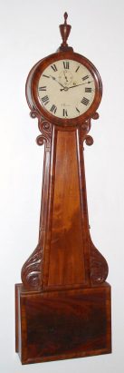 C.1830, Attributed to Abiel Chandler, Concord, NH, seconds pendulum wall banjo, in a mahogany paneled case with carved trim. The sister to this clock [with gilt finial] appears in Distin and Bishop, page 248, fig.580. — Antique Clocks Price Guide