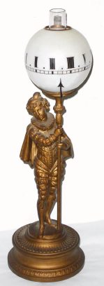 C.1890, French figural "night" clock. Statue of a young man in court dress, with a glass globe, chimney, oil cup and wick holder, 8-day platform mov't. — Antique Clocks Price Guide