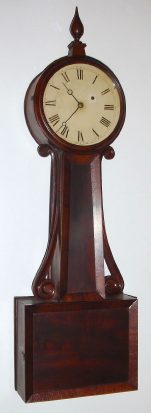 C.1840, Attleboro Banjo Timepiece,  8-day weight driven in a mahogany paneled case with carved wood side arms. — Antique Clocks Price Guide