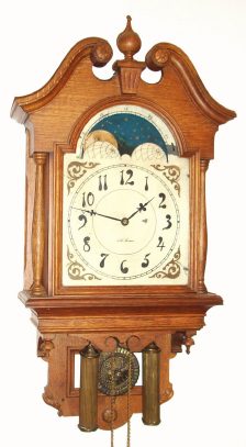 C.1894, Seth Thomas Clock Co., LUNAR, 8-day time and strike wall clock in oak. — Antique Clocks Price Guide