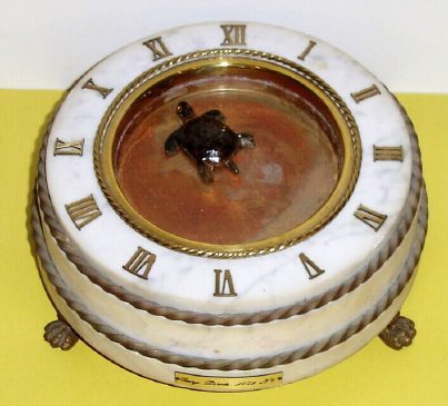 C.1974 (dated), George Dorne', TURTLE CLOCK,  In gray marble with gilt bronze trim, and with battery movement. — Antique Clocks Price Guide
