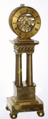C.1870, French miniature skeleton clock on stand. 8-day time only movement on bronze stand, gilt dial, no dome. — Antique Clocks Price Guide