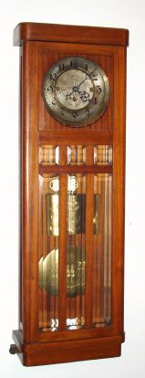 C.1900, German, Gustav Becker, 3-Wt Grand Sonnerie, Wall Regulator, in a walnut veneered box style case with engraved dial center, weights and pendulum. — Antique Clocks Price Guide