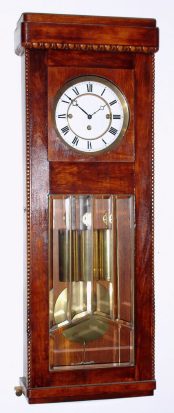 C.1900, German, Gustav Becker, 3-Wt, Grand Sonnerie, box style wall regulator, in a refinished birch case, now with mahogany stain, serial number 616167. — Antique Clocks Price Guide