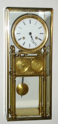 C.1900, French, Calendar clock mounted into a rafter style frame with brass edged glass cover, a plate below the dial engraved later with the name L'epine, a` Paris. — Antique Clocks Price Guide