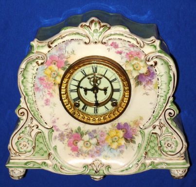 C.1901, Ansonia, Royal Bonn, LA MARNE, porcelain china clock, 8-day time and strike with open escapement on the dial. — Antique Clocks Price Guide
