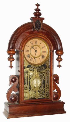 C.1880, Ansonia Clock Co., PARISIAN,  8-day parlor clock in black walnut, bell strike, and with fancy indicator pendulum. — Antique Clocks Price Guide