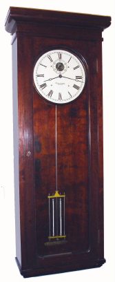 C.1920, E. Howard and Co., Master clock with 2-vial mercury pendulum, modified with Telechron 110 v. motor for winding. — Antique Clocks Price Guide