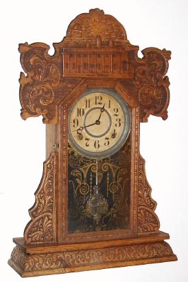 C.1915, E. Ingraham and Co., Mt. Vernon pressed oak kitchen clock from their "National" line. — Antique Clocks Price Guide