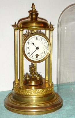 C.1906, German, 400 Day Timepiece, LOUVRE  model, with original dome and disc pendulum. — Antique Clocks Price Guide