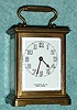 C.1909, Chelsea for TIFFANY and CO., New York, time only carriage clock in a French style brass and glass case. 