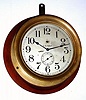 C.1920, Seth Thomas for US Navy, 8.5" diameter dial (7.5" chapter), 8-day time only 7 jeweled movement, in a turned brass case 10.5" diameter, sold as "Ship's lever No. 8" 