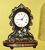 C.1853, Chauncey Jerome, New Haven, shelf timepiece, with patent S.N. Botsford movement, in a Litchfield Mfg. paper mache case. 