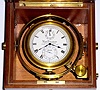 C.1910, Swiss, Paul Ditisheim, Chronometer Watch, or as included literature calls it Chronometer, Petit Format, 21j, key wound, going barrel with enclosed compensated balance, 2-day, in a full 3-piece mahogany case with brass corners. 