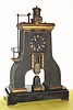 C.1880. French, Guilmet, Paris, "STEAM HAMMER" Clock from the Industrial Series, with a complex pendulum that changes power direction 7 times before reaching the final "pendulum hammer". 
