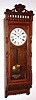 C.1905, Ansonia Clock Co., SANTA FE, eight day, double weight timepiece in a black walnut case. 