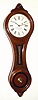 C.1976 (mov't dated 3-19-76) E. Howard and Co., Boston, Regulator No. 10, figure eight wall clock in a walnut case, 8-day weight driven, time only, serial No. 60. This clock was among the first shipped when this re-issue model was introduced in 1976, and was sold by advance subscription to NAWCC members. 