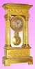 C.1870, French, 4-Column Empire Style mantel clock of all ormolu, with finely chased garland appliques and Corinthian capitals.