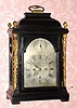 C.1800, Crafts Mackay, Boston, 2-fusee bracket clock with crown verge escapement and pull cord repeat, striking on a large bell, the case with caryatids to the corners and pineapple finials and brass dial with calendar aperture at 6. 