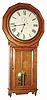 C.1880, Seth Thomas Clock Co., REGULATOR No. 3, in oak, single weight wall clock with 12 sided top bezel, painted dial and pendulum visible through glazed door. 