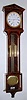 C.2006, Austrian Reproduction Laterndluhr, YEAR RUNNING, weight driven, full length compensating meter pendulum, knife edge susp, in a crotch mahogany veneer case with holly edge trim. 