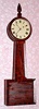 C.1850, Southeastern Mass, Weight banjo, 8-day, in a mahogany paneled case, and with original movement, dial and weight. 
