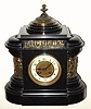 C.1890, French, Belgian Slate and Bronze mantel clock, 8-day time and strike, the sides and top bronze frieze showing classic Greek and Roman figures. 