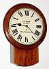 C.1890, English Drop-Dial Clock: Eight-day time-only fusee mahogany case wall clock. 