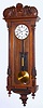 C.1890, Austrian, 1-Wt "Vienna Regulator", timepiece in a walnut wall case of the Alt Deutsch style, with a top from another piece of furniture. 