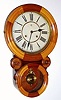 C.1891 Waterbury Clock Co., Waterbury, CT:  Bahia Mosaic model in contrasting maple and walnut woods with 8-day time and strike movement. 