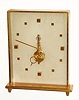 C.1985, Swiss, LeCoultre, Desk timepiece, a gilt brass frame, with a rear wind 16j movement, stacked vertically in skeleton style, the balance at the apex, with gilt brass studs for numerals on a frosted background. 