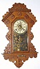 C.1896, E. Ingraham and Co., HANGING GINGERBREAD, from the Chicago line, pressed oak, 8-day time strike and alarm. 