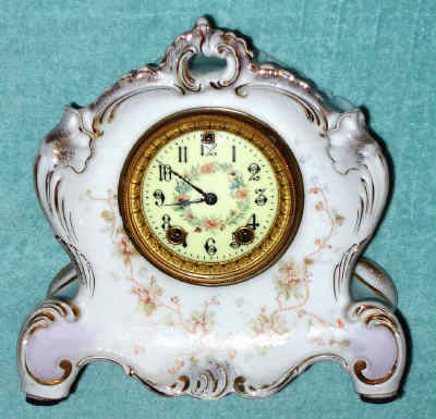 C.1898, Wm. L. Gilbert, Winsted, Conn, Porcelain No. 531, 8-day time and gong strike mantel clock, with porcelain dial and floral decorations. — Antique Clocks Price Guide