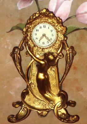 C.1913, New Haven Clock Co., "TROUVILLE" Gilt spelter figural clock in the Art Nouveau style, 30-hour. — Antique Clocks Price Guide