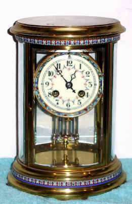 C.1900, French, Marti et Cie, 8-day time and strike, 4-glass OVAL crystal regulator, with enamel trim. — Antique Clocks Price Guide