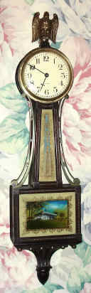 C.1925, Waltham Clock Co., Mass, Mini banjo, model No. 1554, in walnut with rope accent. — Antique Clocks Price Guide