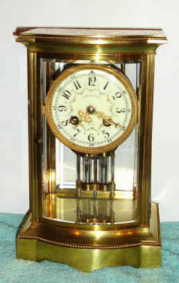 C.1900, Dated, French, 8-day time and strike, 4-glass, crystal regulator. Given as a gift to "CMC" Dec 25, 1900, and with bow front and beaded top and bottom edges — Antique Clocks Price Guide