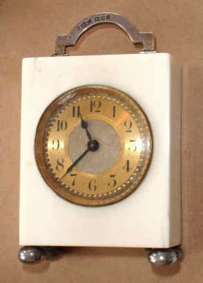 C.1900, French, Mini Carriage Timepiece, the case of ivory, and the feet and handle of sterling, 8-day. — Antique Clocks Price Guide