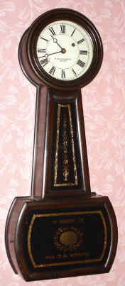 C.1920, E. Howard Clock Co., "No. 5 Banjo", 8-day wall timepiece with special original glasses to memorialize Mrs. O.D. Webster of Franklin, New Hampshire, who was the wife of one of the descendents of Daniel Webster. — Antique Clocks Price Guide