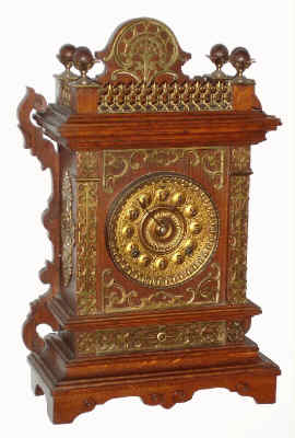 C.1894, Ansonia Clock Co., "CABINET - F", oak cased parlor clock in the Antique style with profuse brass decorations. — Antique Clocks Price Guide