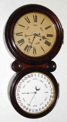 C.1886, E. Ingraham and Co., IONIC CALENDAR, rosewood veneer rear case and grained bezel, 8-day, time and gong strike, double dial perpetual calendar. — Antique Clocks Price Guide