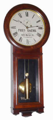 C.1910, Seth Thomas Clock Co., "Regulator No. 2" in mahogany, one weight, with advertising for Fred Baehr, 1403 Market St (somewhere in Lancaster County, PA). — Antique Clocks Price Guide