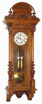 C.1875, Austrian, Gebruder Resch, Ebensee, 2-wt Vienna Regulator, in a carved walnut case with original top and 3/4 columns. — Antique Clocks Price Guide