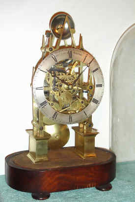 C.1845, English, Robert Norton, Stamford, 2-Fusee Skeleton Clock, in a sharp gothic frame, all the wheels with six spokes or crossings, striking on a bell, and with old dome. — Antique Clocks Price Guide
