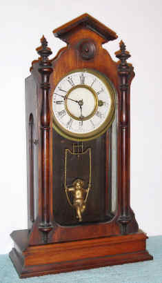 C.1878, F. Kroeber Clock Co., NY, ANGEL SWING No. 1, 8-Day timepiece, angel pendulum swings front to back. — Antique Clocks Price Guide