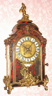 C.1890, French, Boulle Clock, in the style of a century earlier, the dial with a signet signed Thuret, Paris; inlaid brass into shell veneer and with cast bronze mounts, the brass dial with 12 individual porcelain signets with Roman numerals. — Antique Clocks Price Guide