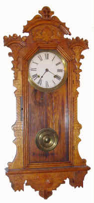 C.1895 E. Ingraham and Co., Bristol CT, PACIFIC, 8 day, time and strike oak wall clock. — Antique Clocks Price Guide