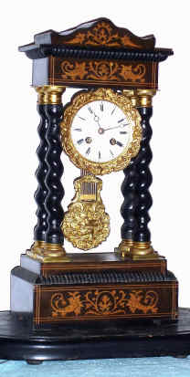 C.1875, French, Japy Freres, 4-Column Empire style mantel clock, inlaid case with barley twist columns and gilt capitals, plus old glass dome and base. — Antique Clocks Price Guide